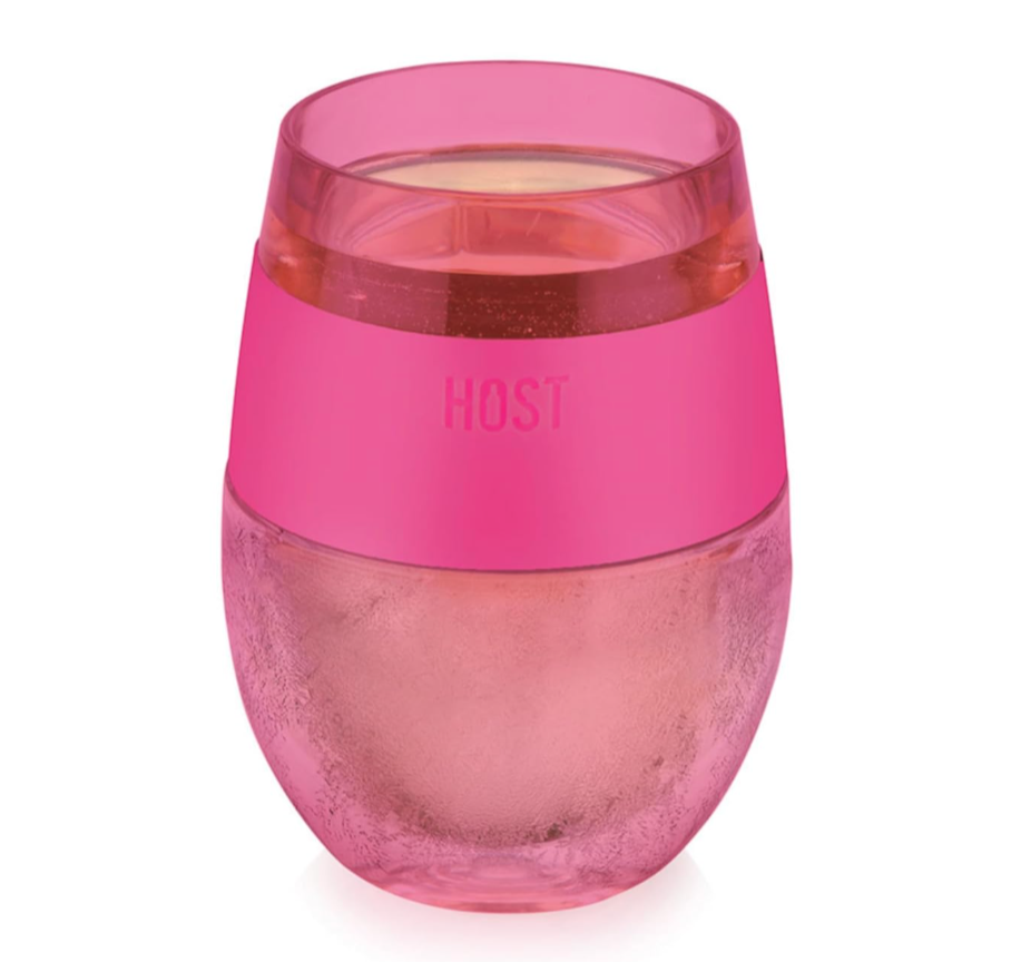 Pink wine tumbler with a clear base on a white background