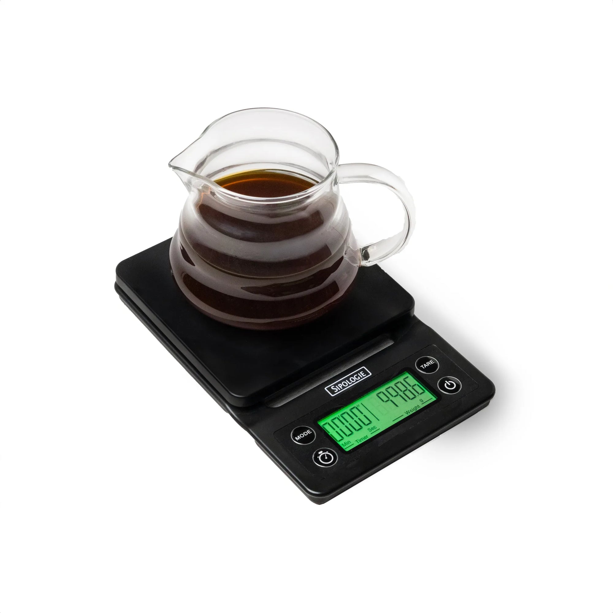A black digital kitchen scale with a clear glass carafe filled with dark coffee, shown on a white background. The scale has a green backlit LCD display showing '1000 g' and the brand name 'Korona' is visible on the front.