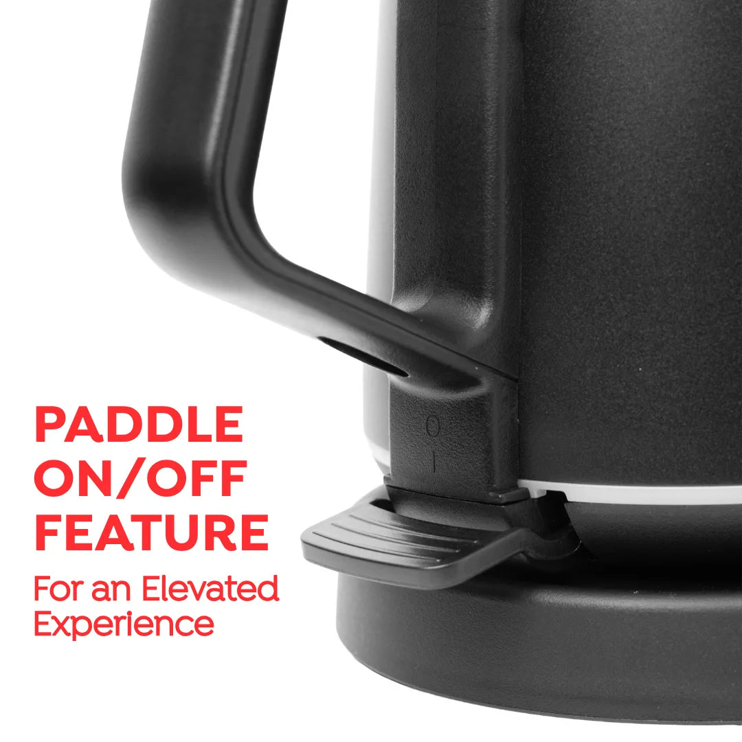 Close-up of a black electric kettle showing the paddle-style on/off switch and base, with red text reading 'PADDLE ON/OFF FEATURE For an Elevated Experience' on a white background.