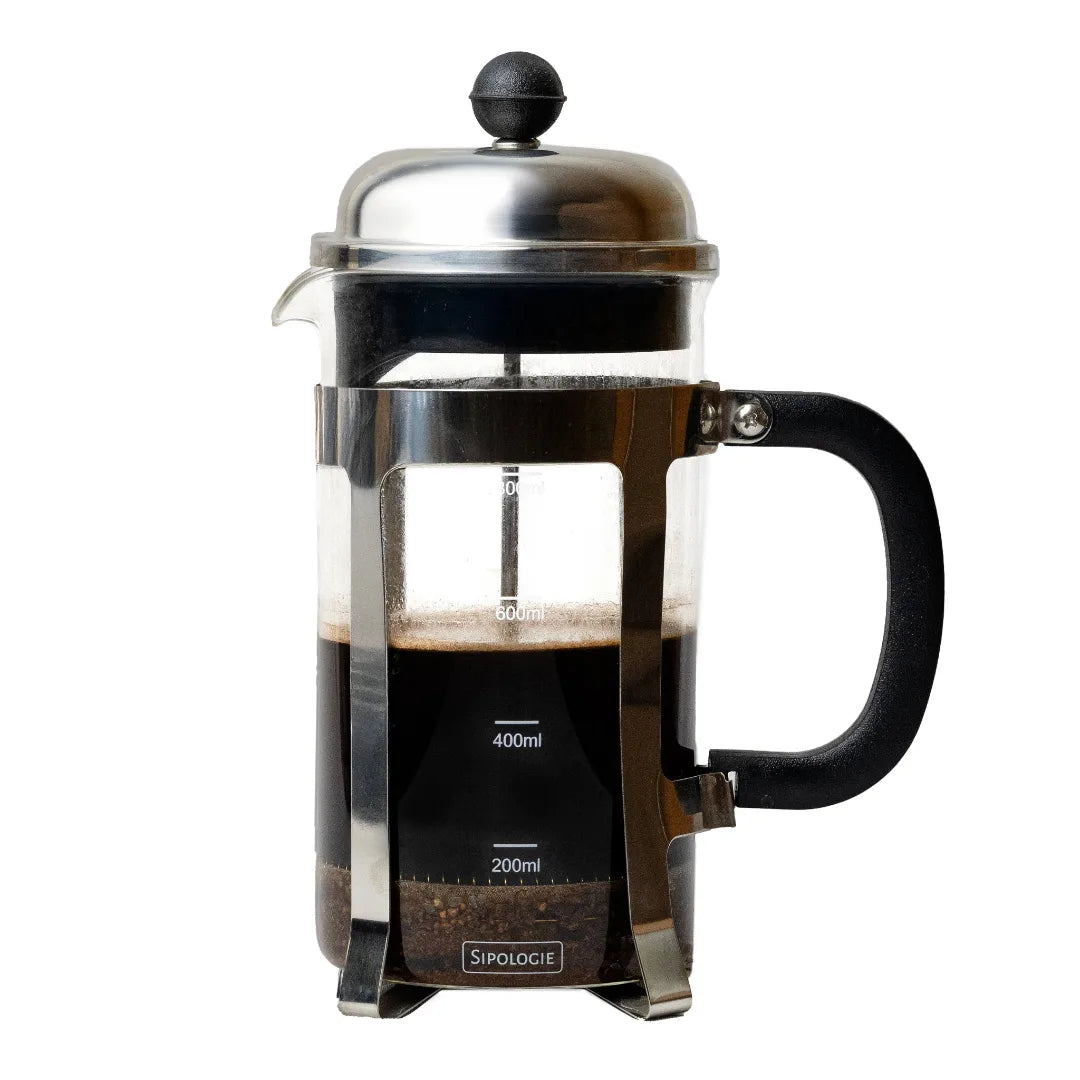 A Sipologie French press coffee maker with a clear glass body, black handle, black plastic filter basket, and stainless steel lid and frame. The glass is partially filled with dark coffee, and the product is photographed against a solid white background.