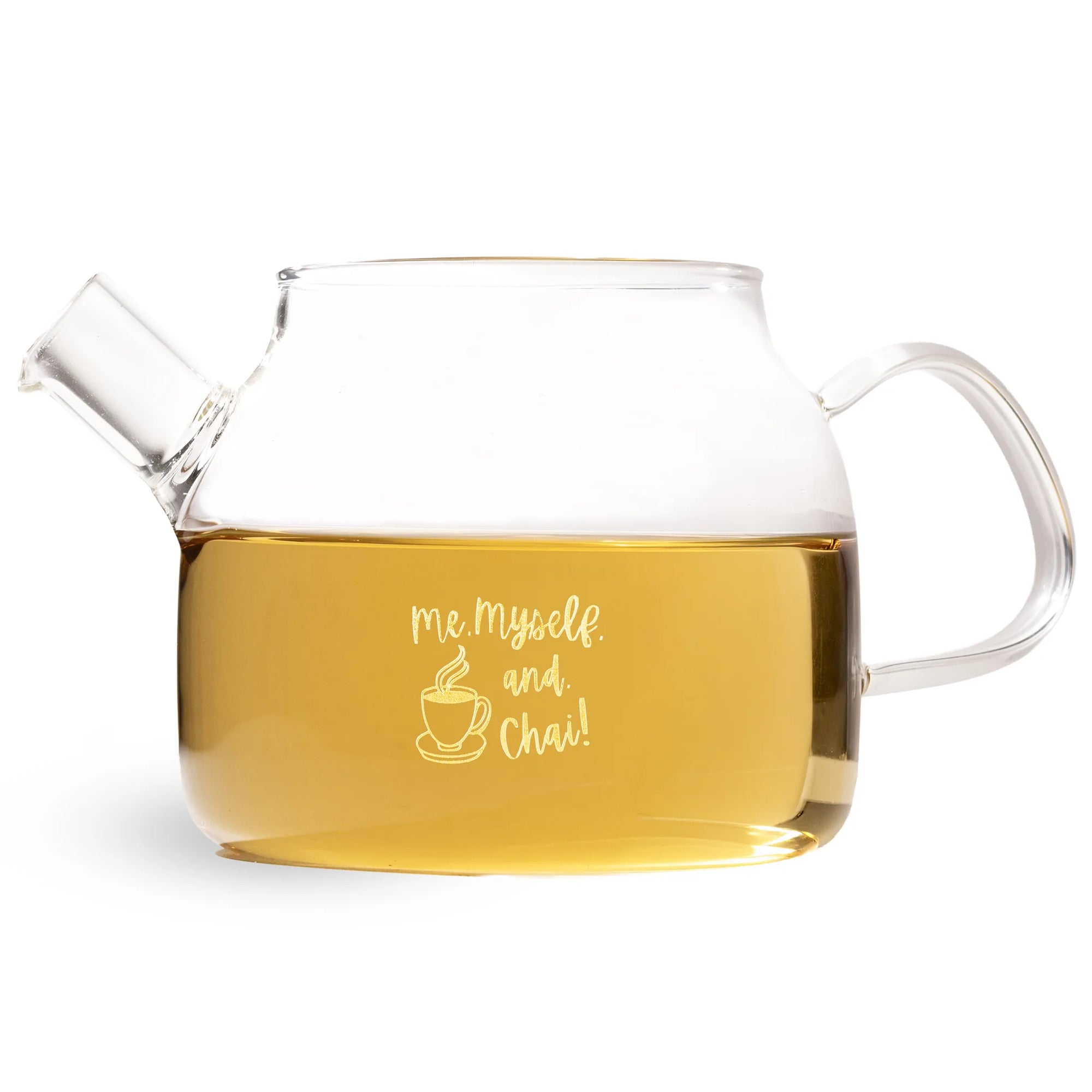 A clear glass teapot filled with golden tea, featuring the phrase 'me, myself, and chai!' printed in white script on the front, set against a plain white background.