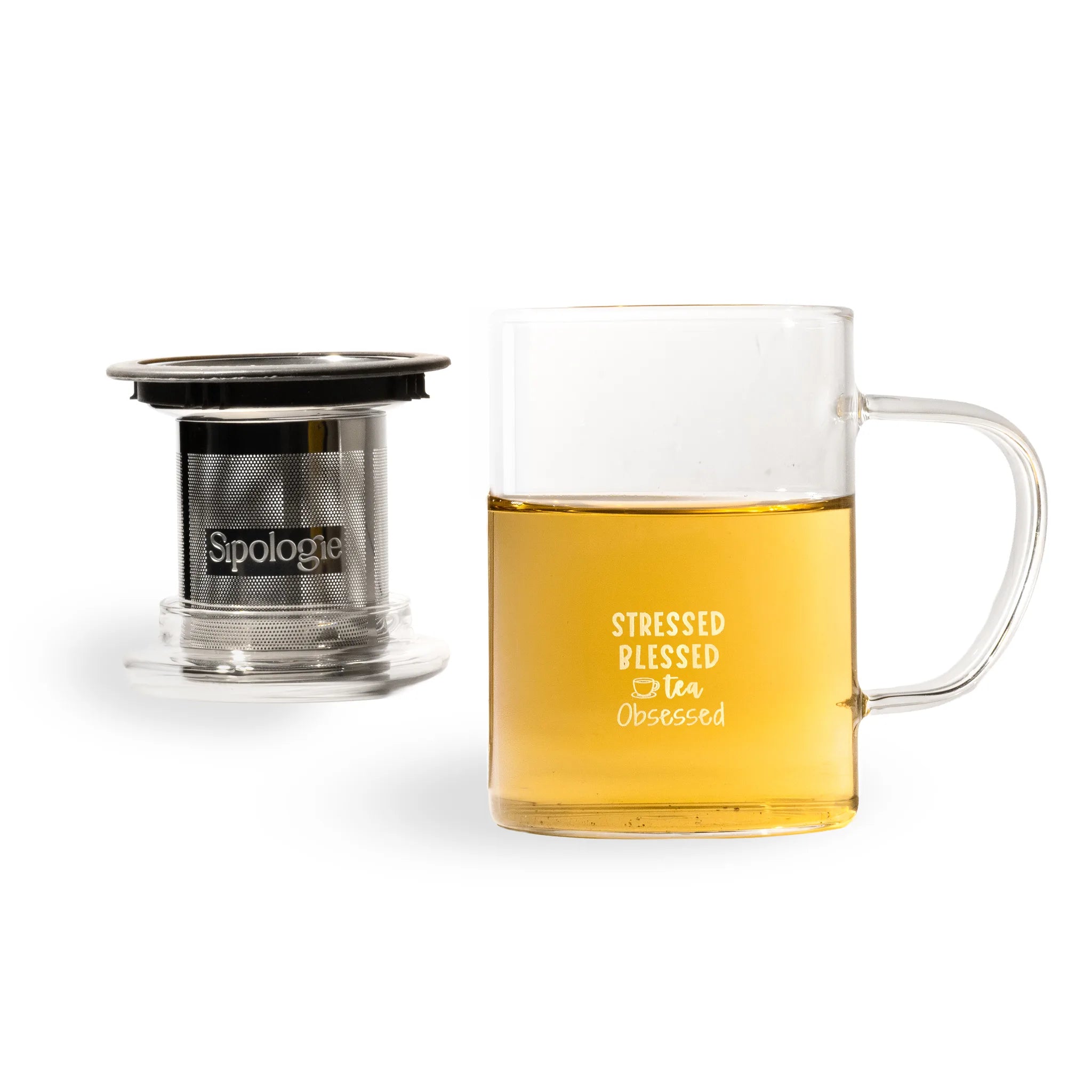 Tea mug with handle and tea infuser on a white background