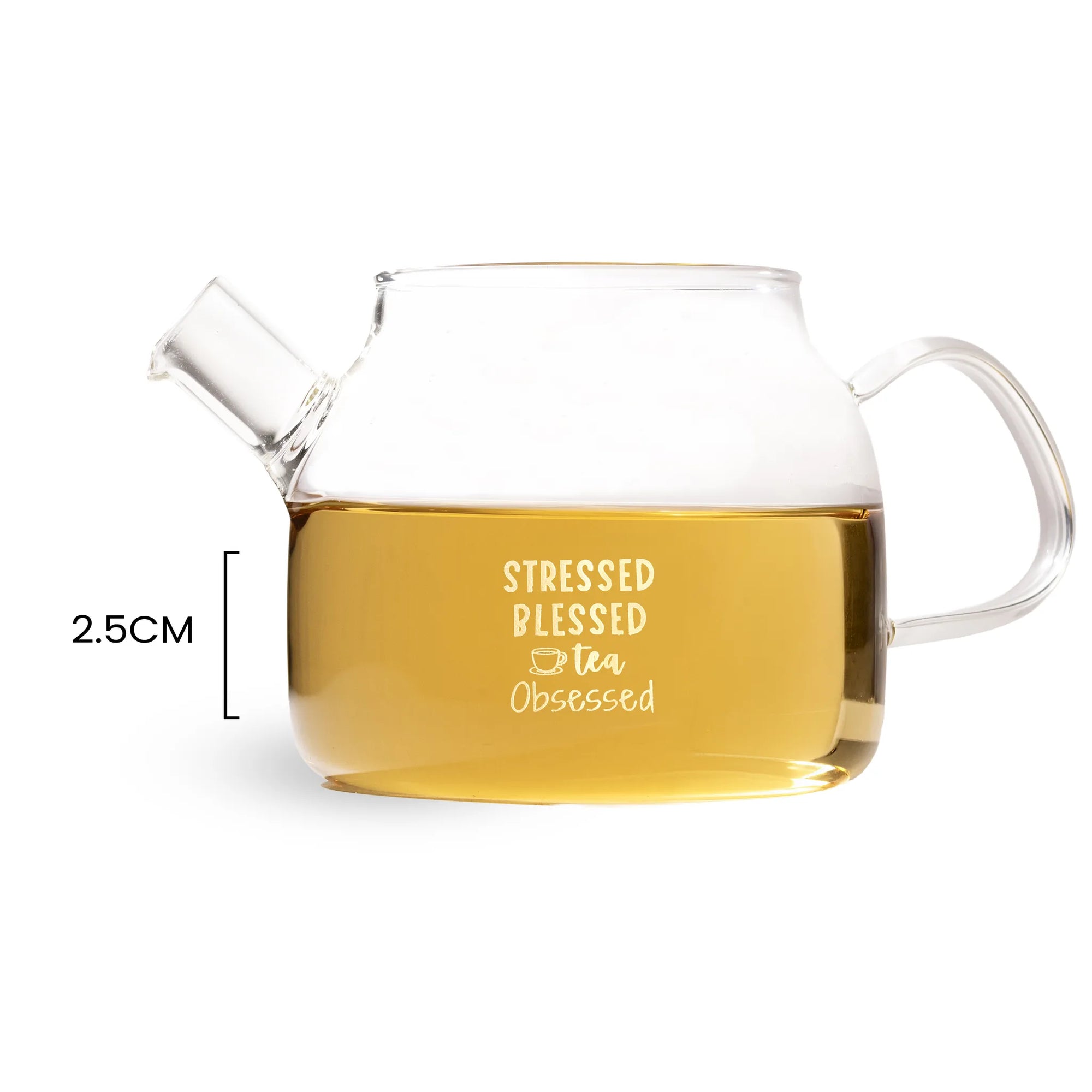 Clear glass teapot filled with tea, featuring the phrase 'STRESSED BLESSED tea Obsessed' printed on the front. A dimension marker on the left indicates a height of 2.