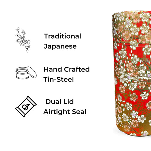 A cylindrical tin canister with a traditional Japanese floral pattern in red, gold, and white, shown next to feature callouts on a white background.