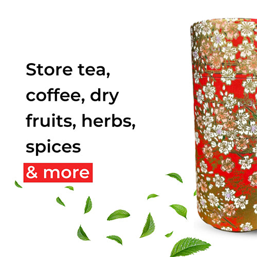 A cylindrical storage container with a red and gold floral pattern, shown next to promotional text reading 'Store tea, coffee, dry fruits, herbs, spices & more' on a white background with scattered green leaves.